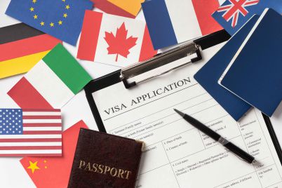 visa-application-composition-with-different-flags_11zon-scaled.jpg